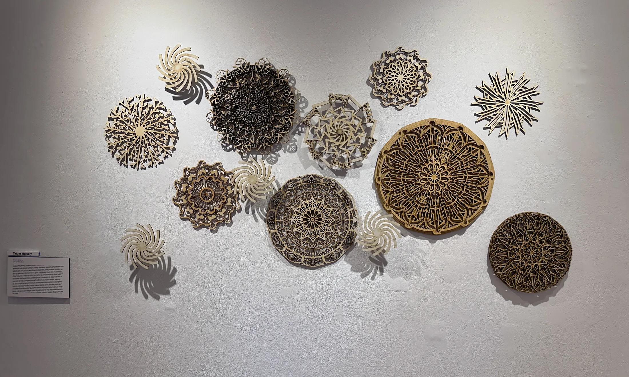 Laser-cut wall works from Inverted Normals.