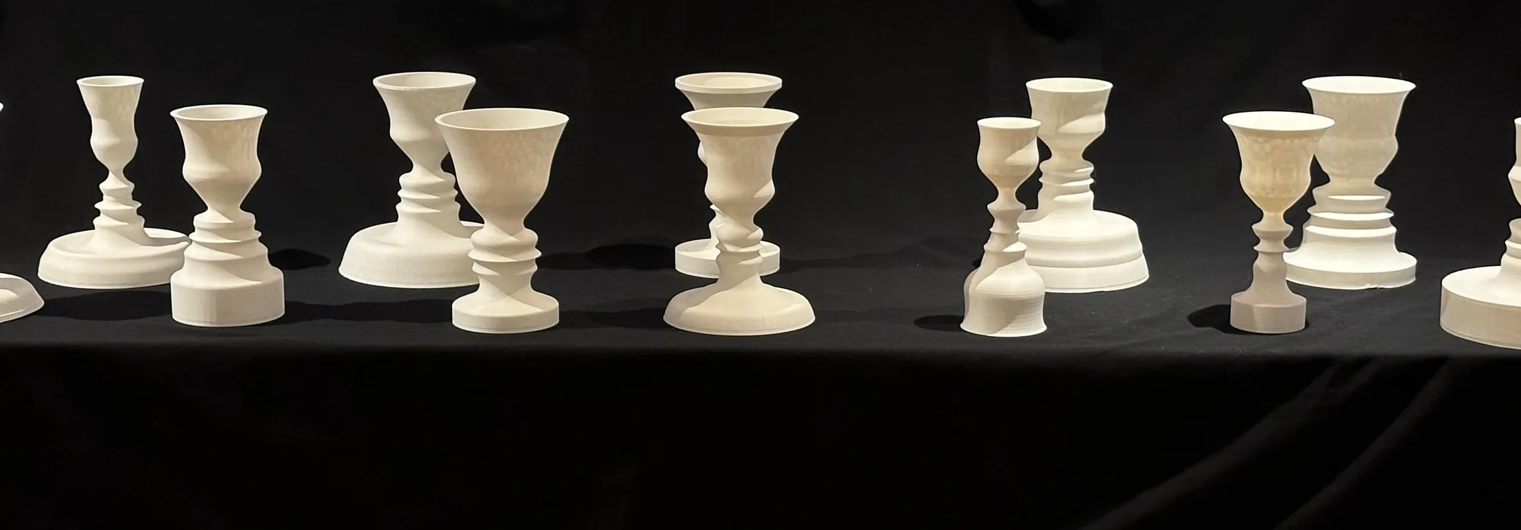 A lineup of white FaceVase works from Inverted Normals.