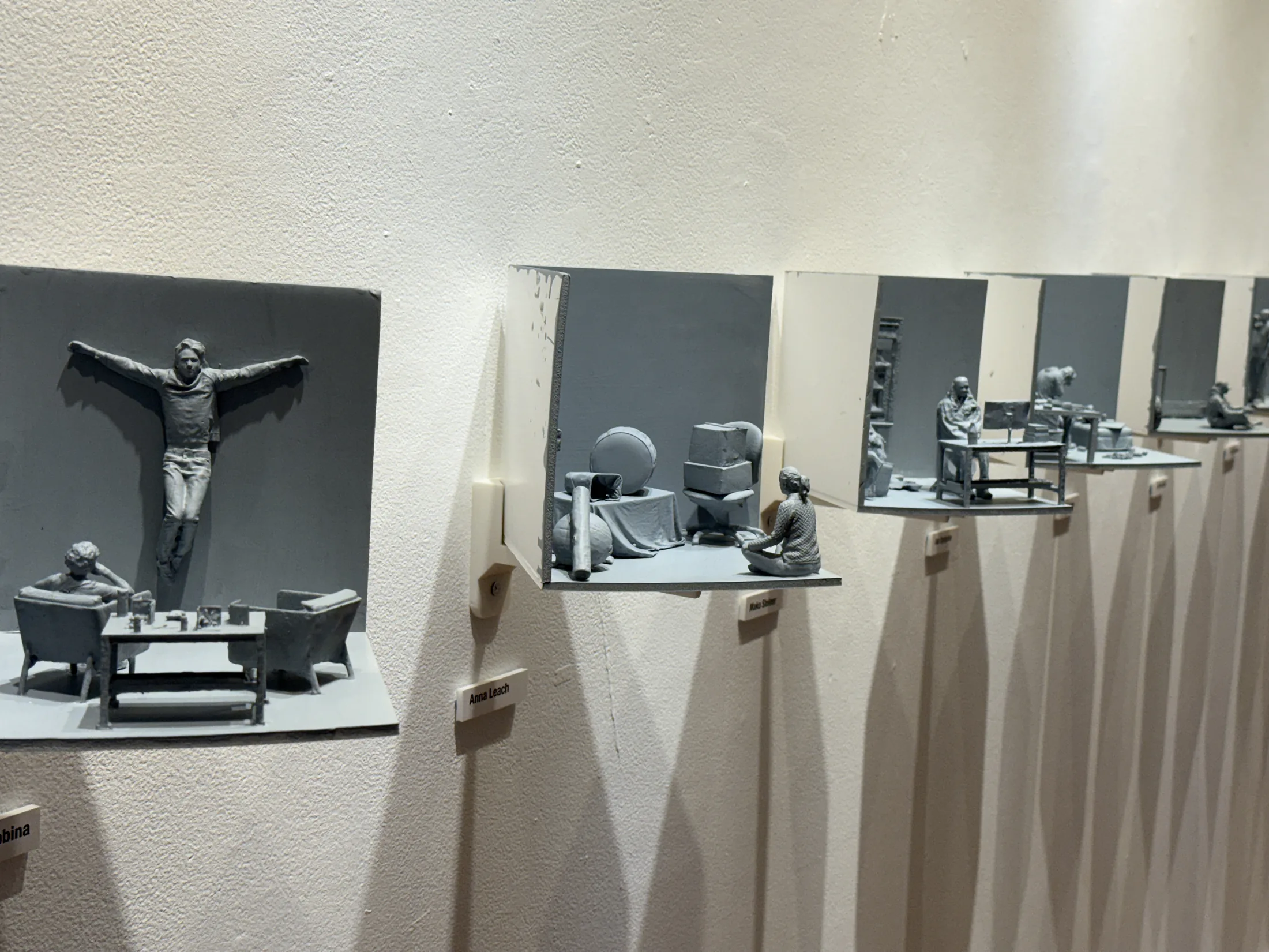 Wall-mounted fabricated sculptures in Pixels to Pieces.