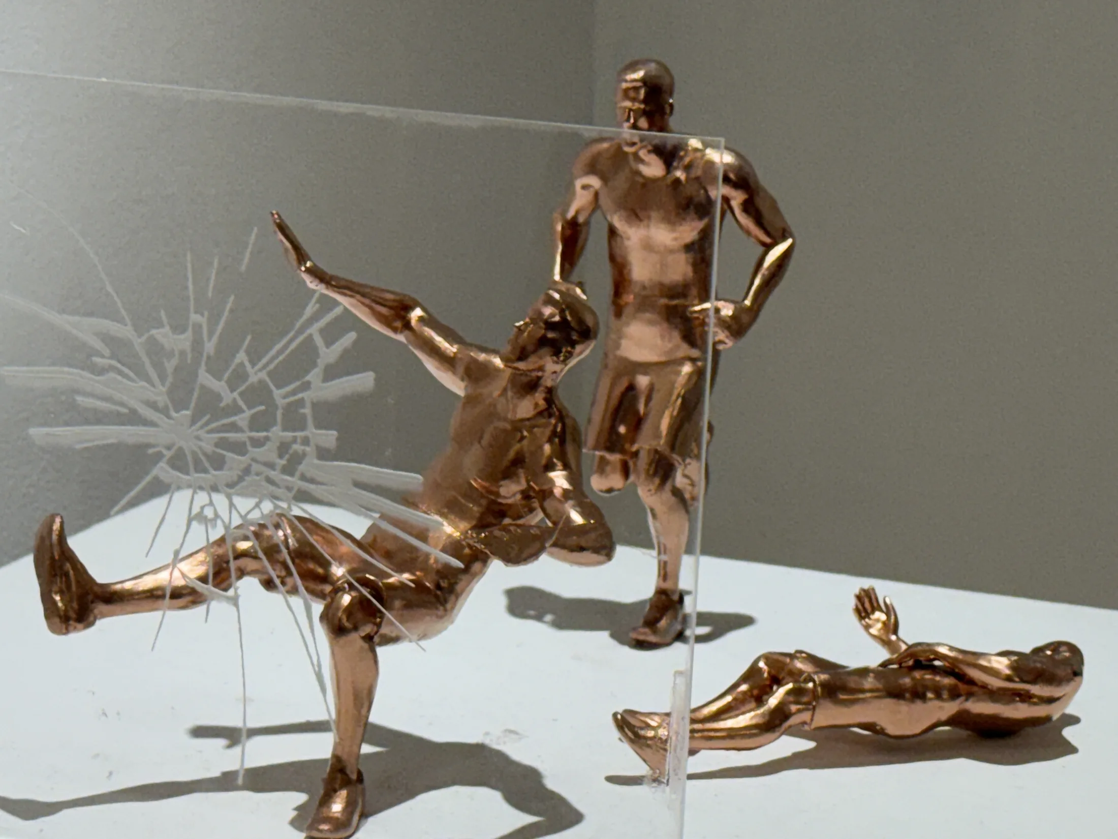 Metallic sculptural figures from Pixels to Pieces.