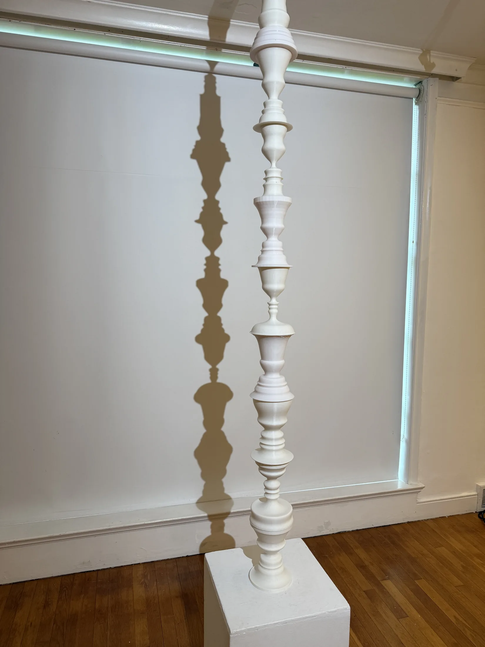 Stacked column sculpture from Pixels to Pieces.