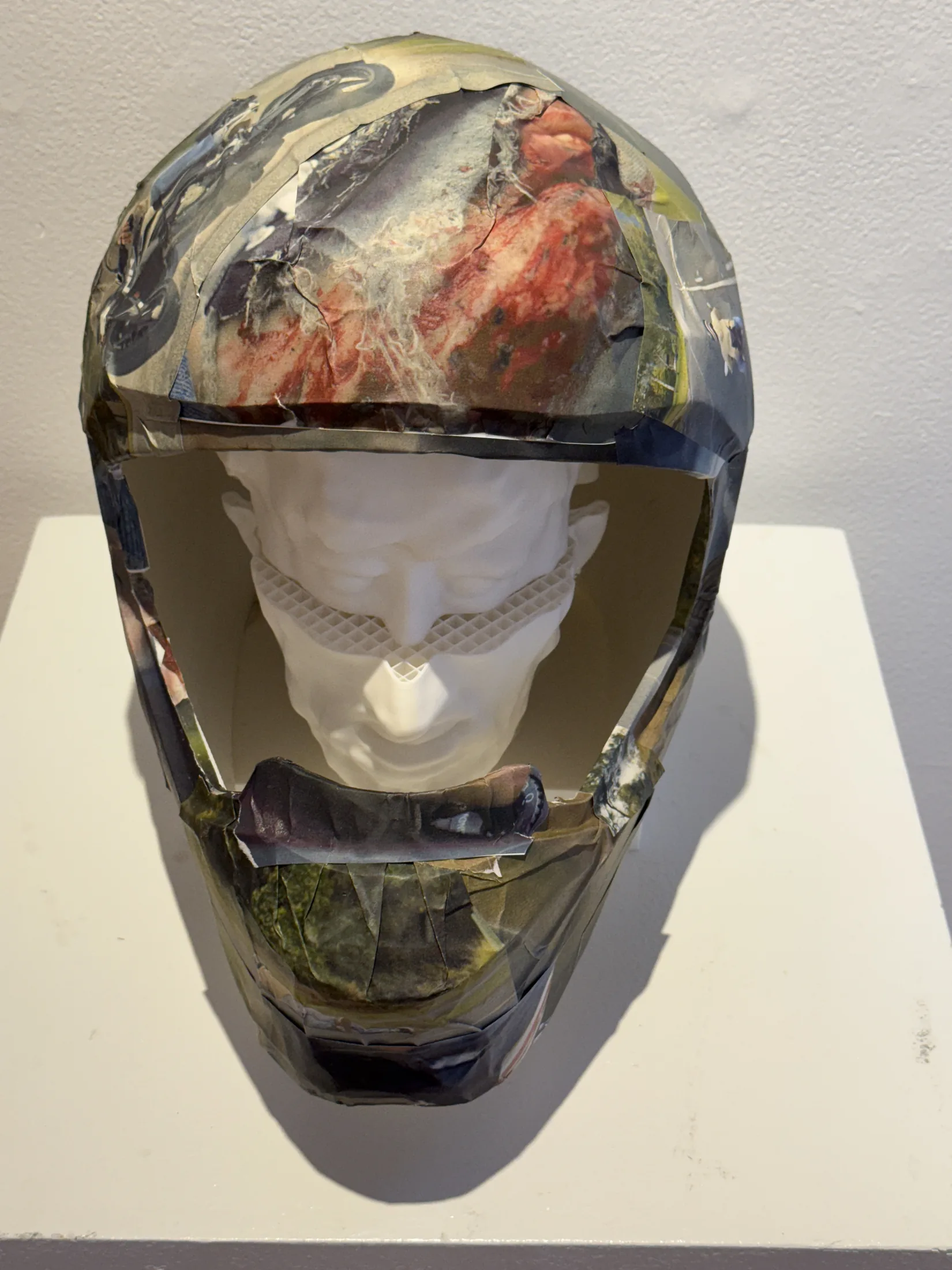 Painted head sculpture from Pixels to Pieces.