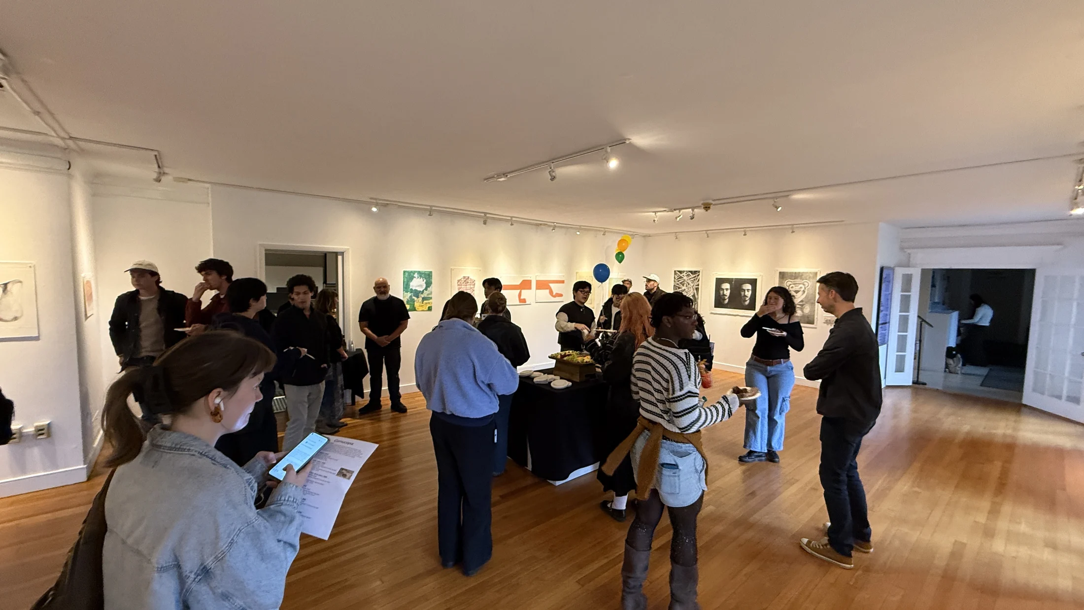 Visitors gathered during the Cornucopia opening reception.