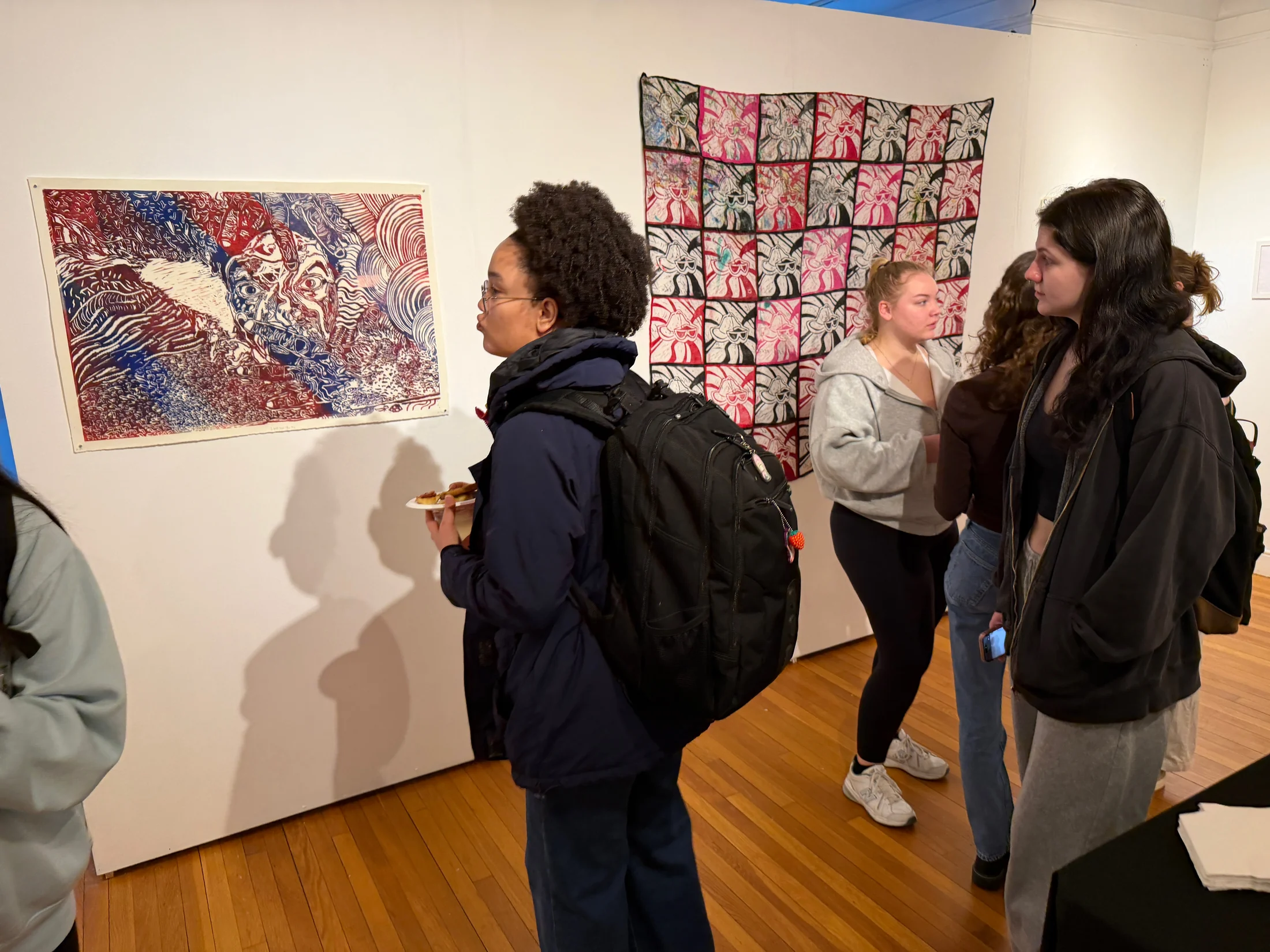 Visitors viewing prints in Big & Small Prints.