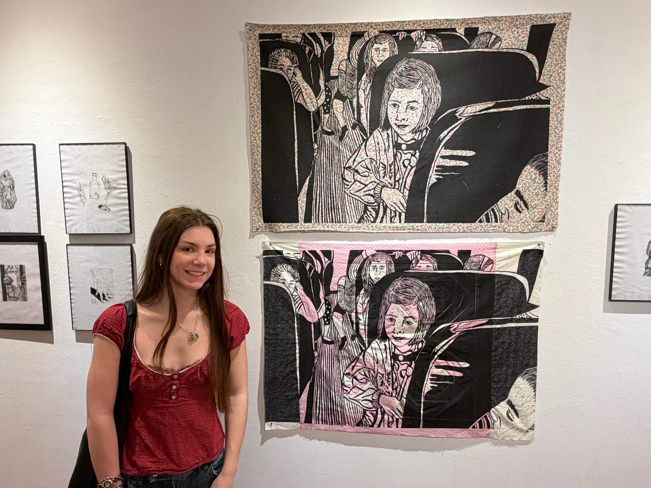 Student artist with large-scale print installation.