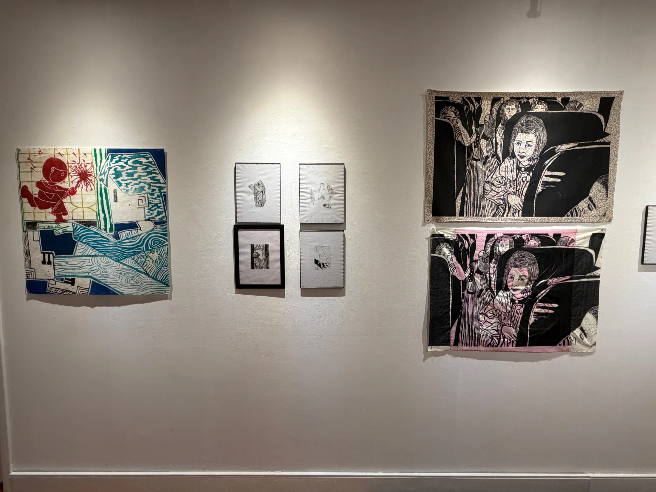 Wall view of prints in Big & Small Prints.