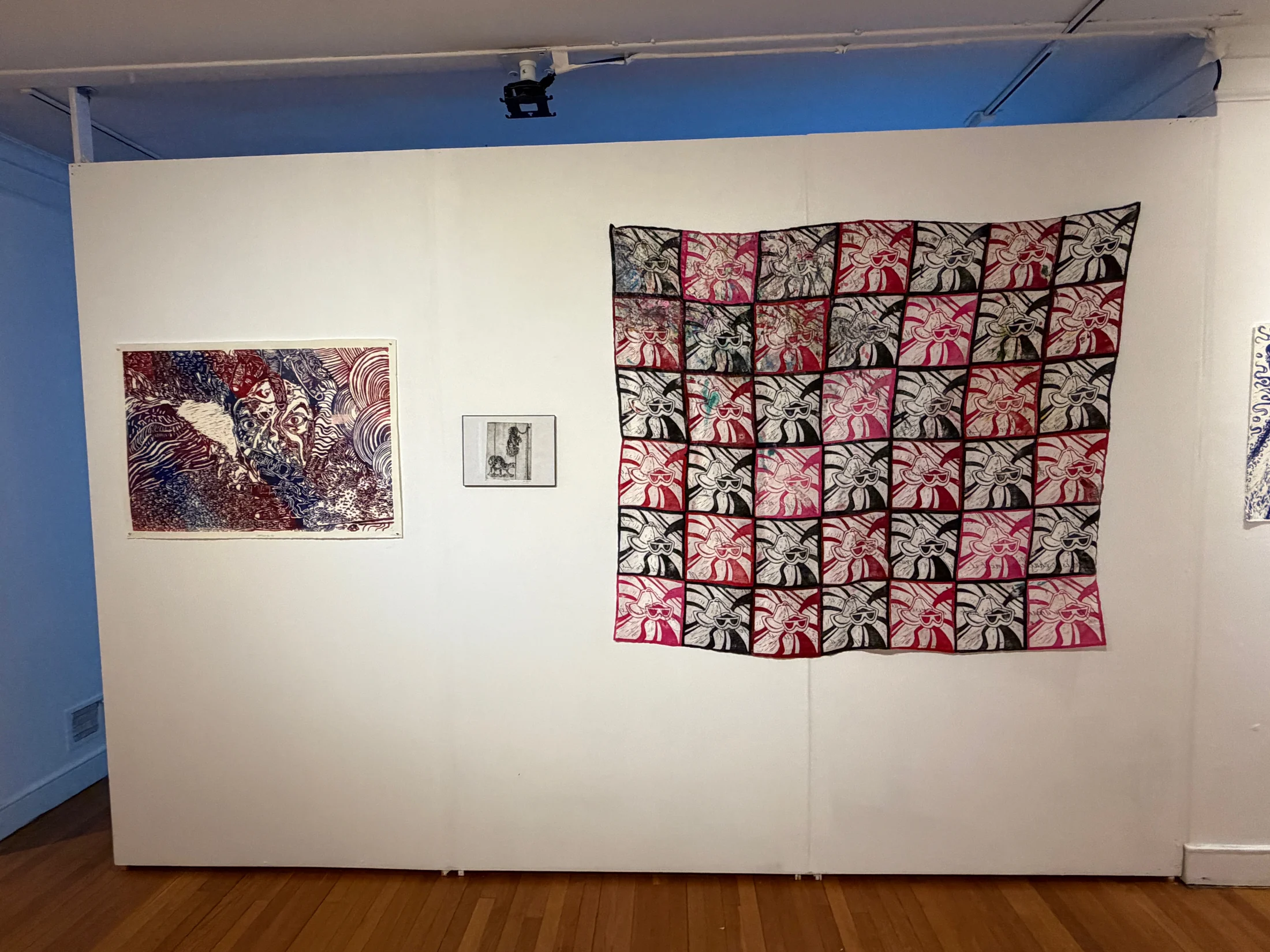 Large and small prints installed together.