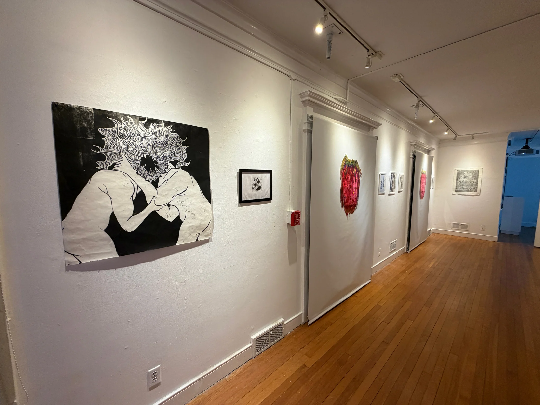 Gallery view of a large black and white print.