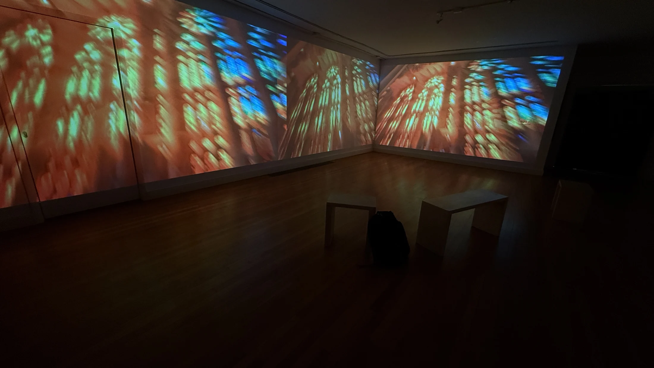 Warm stained-glass inspired projection view from within.