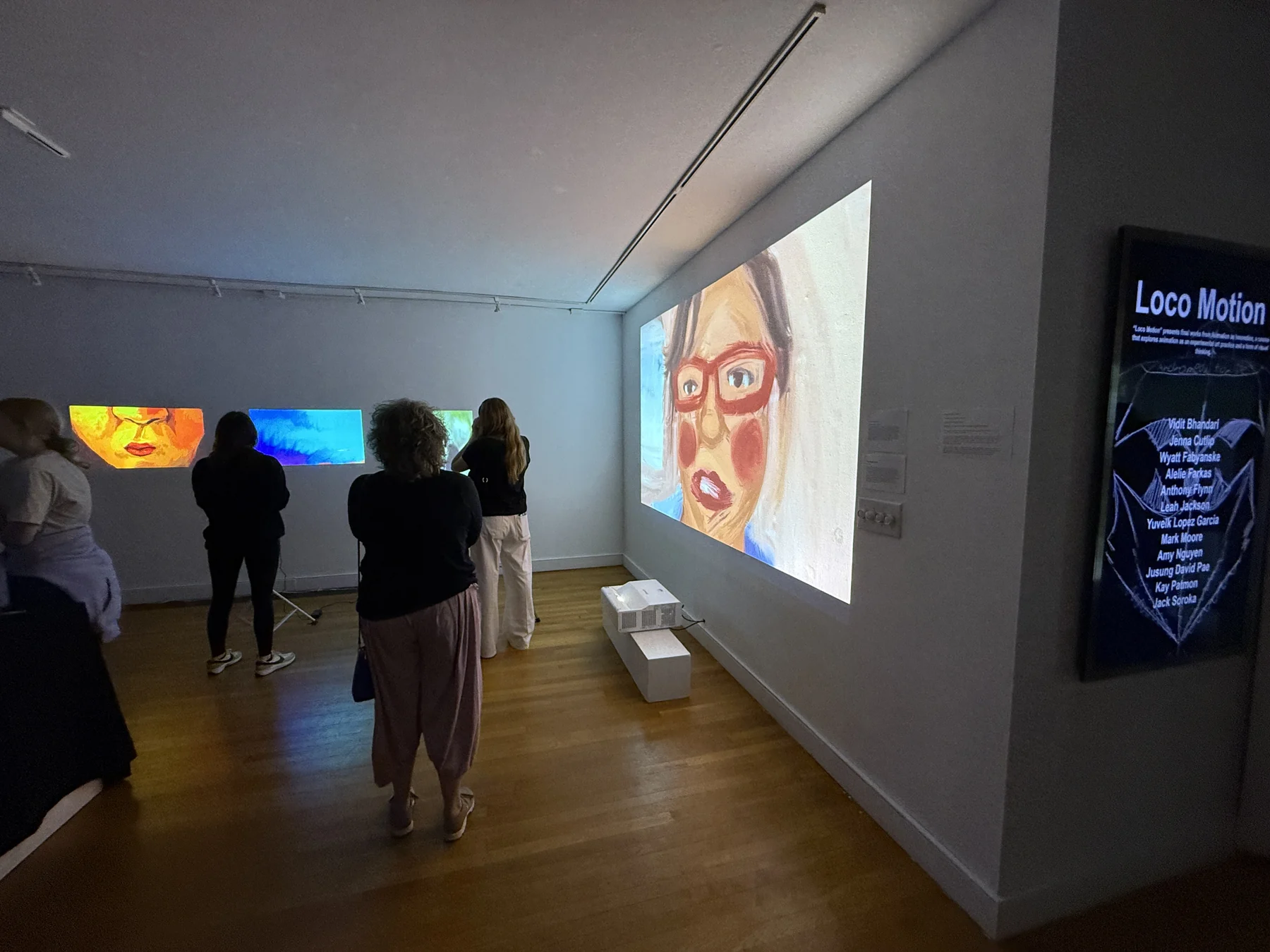 Visitors viewing animation work in Loco Motion.