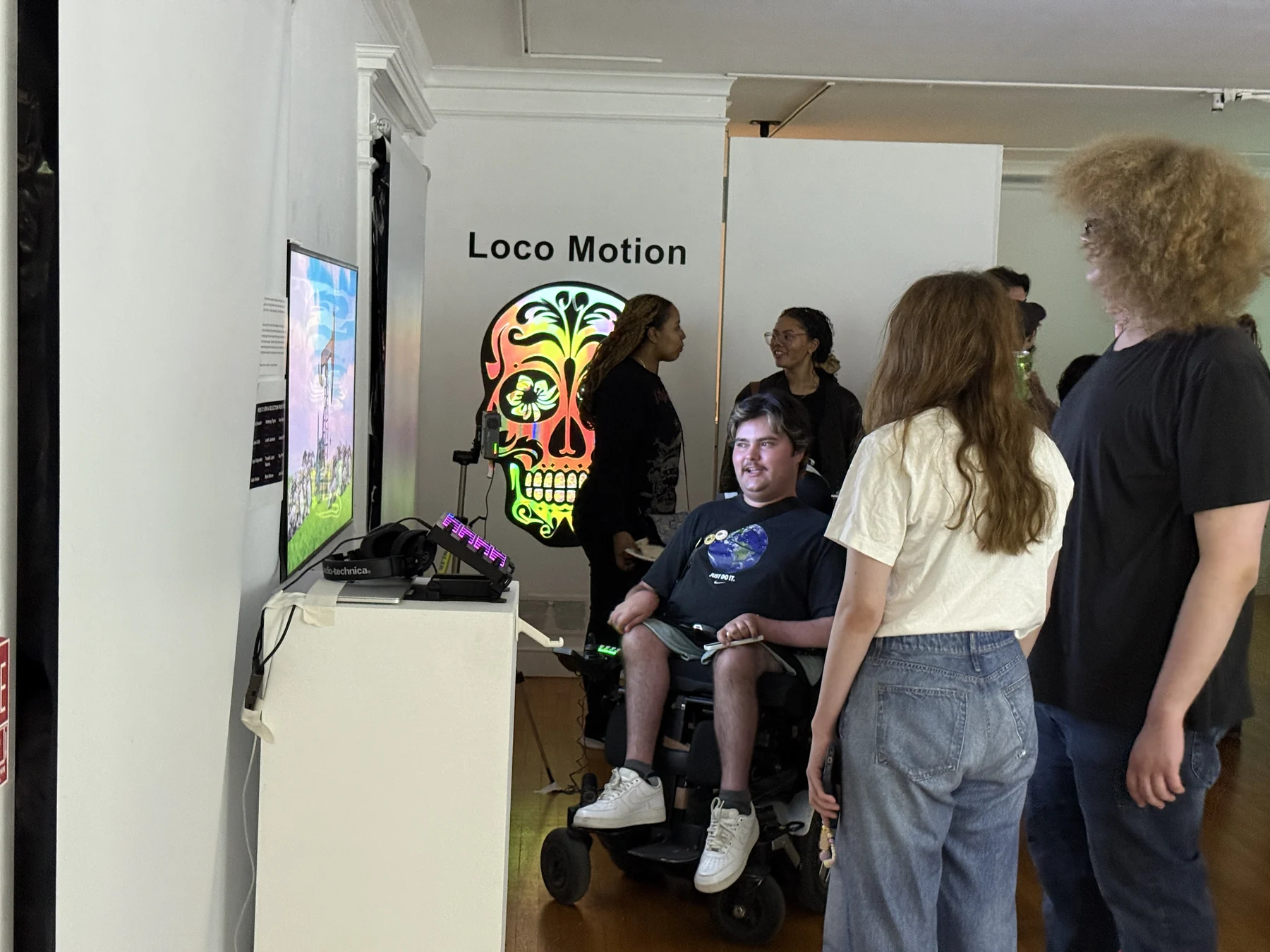 Visitors and title wall for Loco Motion.